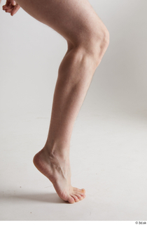 Sigvid  1 calf flexing nude side view 0005.jpg